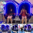 Μπλε πορτοκαλής προσομοιωτής καθισμάτων 9D VR πολυτέλειας με την περιστρεφόμενη πλατφόρμα 360 βαθμού
